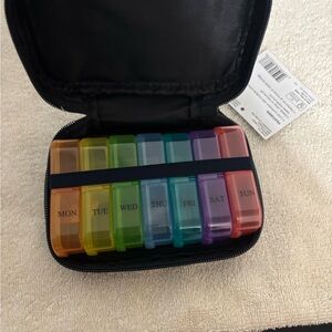 Contain Weekly Pill Organizer with Colorful Compartments.